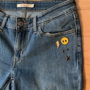 Levi’s 711 Skinny Jeans with Enamel Smiley Face and Stars